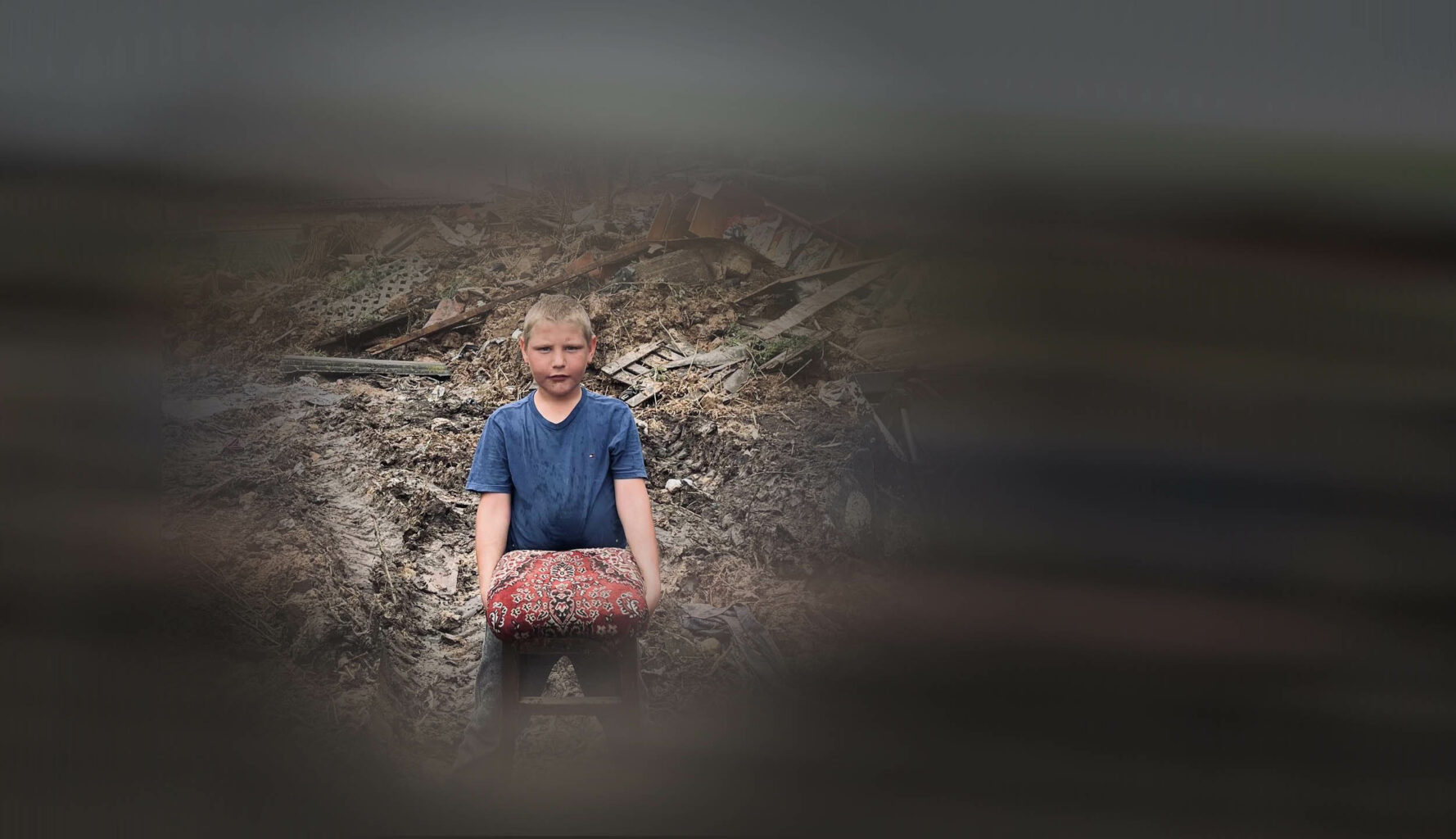 Only a chair left from what was his prents house in the region of the destroyed dam: images of Tolya are from Myroslav Laiuk