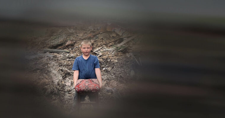 Only a chair left from what was his prents house in the region of the destroyed dam: images of Tolya are from Myroslav Laiuk